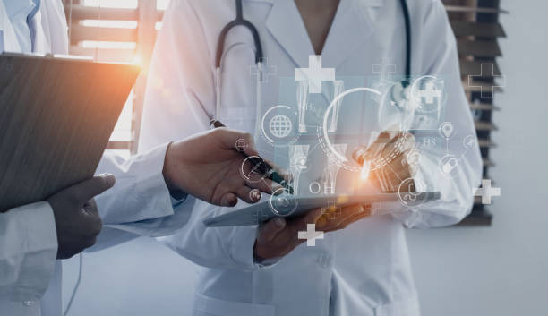 istock Doctor using laptop computer with medical medical network connection icons. 1673369930