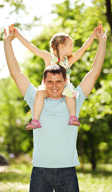 istock Father and daughter in the park 167337918