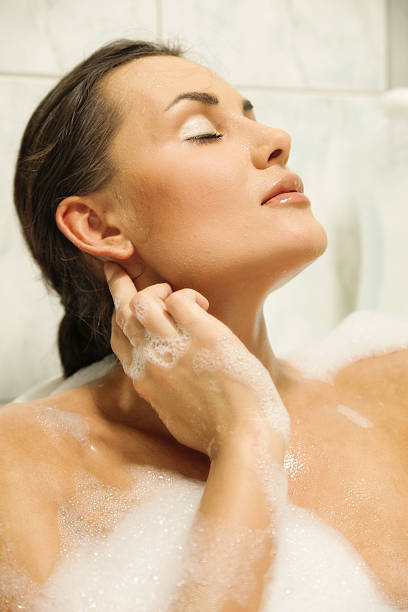 istock Young women relaxing in her bath 167339141