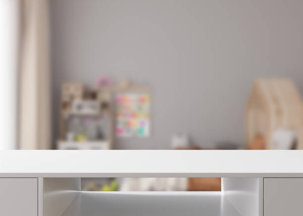 istock Empty white table top and blurred kids room interior on the background. Copy space for your object, product, toy presentation. Display, promotion, advertising. 3D Rendering. 1673426500