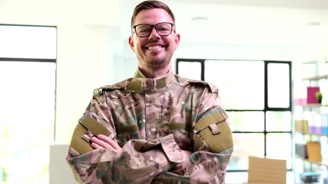 Military officer with glasses crossing his arms portrait 4k movie