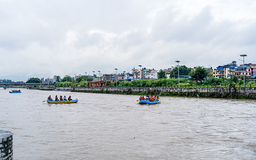 People enjoy to fun rafting at Bagmati river during monsoon season in Kathmandu., Nepal, on  Thursday August 30, 2023