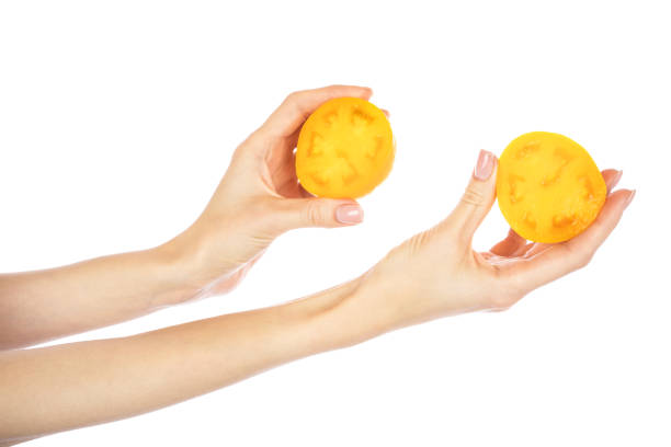 hand holding orange