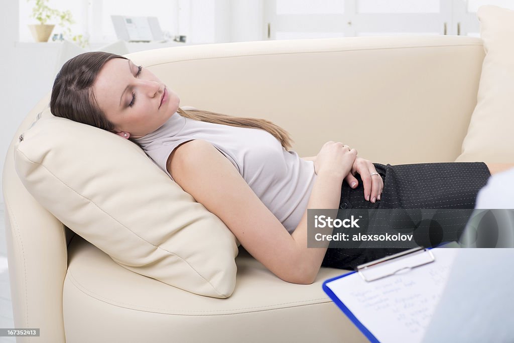 Psychiatrist and woman patient young girl on reception at the psychologist Adult Stock Photo