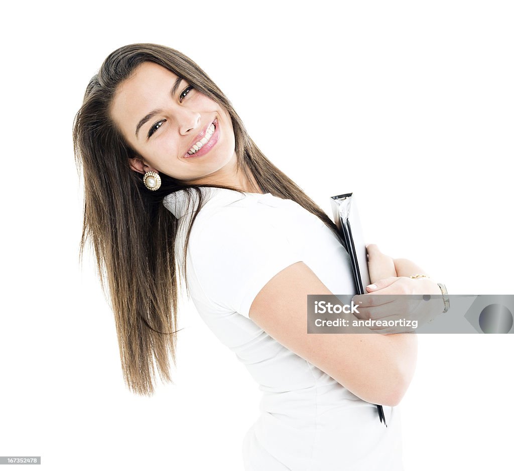 Estudiante sonriente sosteniendo una carpeta de anillas - Foto de stock de Agarrar libre de derechos