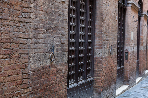 Narrow streets of the city of Toledo with ancient contractions of stone and mud