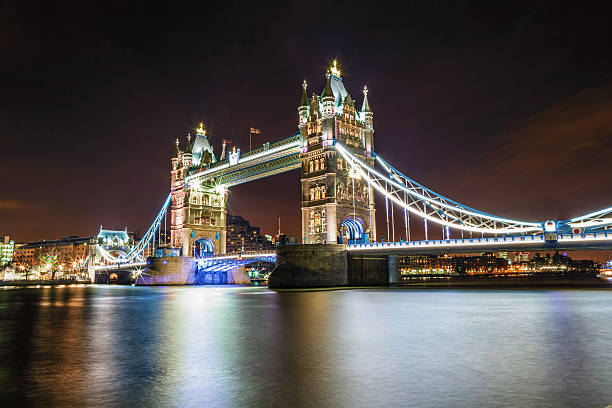 Tower Bridge in London at night stock photo