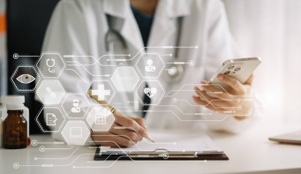 istock Medicine doctor hand working with modern digital tablet computer and smaetphone interface as medical network concept. 1673589600
