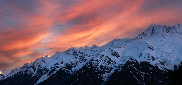 The  sunset view mountain of alpine as snow-capped mount peaks in  Winter mountains, panorama scene