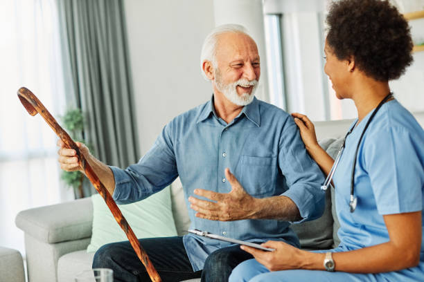istock nurse doctor senior care tablet computer technology showing caregiver help assistence retirement home nursing elderly happy laughing man 1673594946