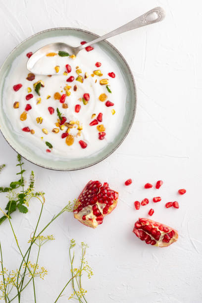 istock Yogurt with raisins, pistachios and pomegranate 1673610060