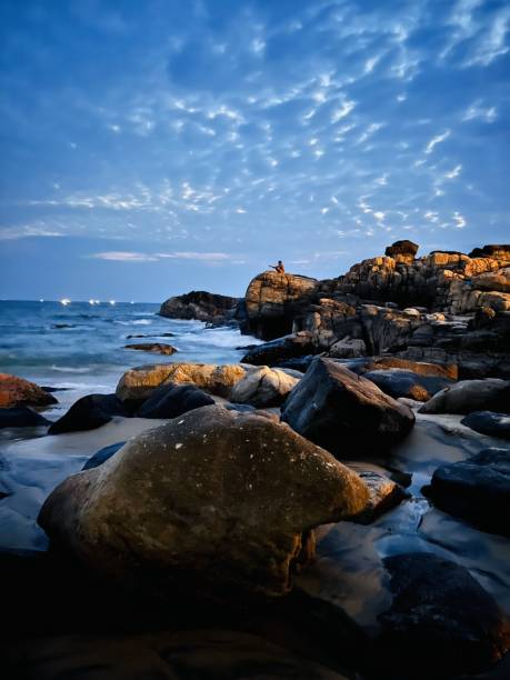 istock Fishing by the beach 1673611130