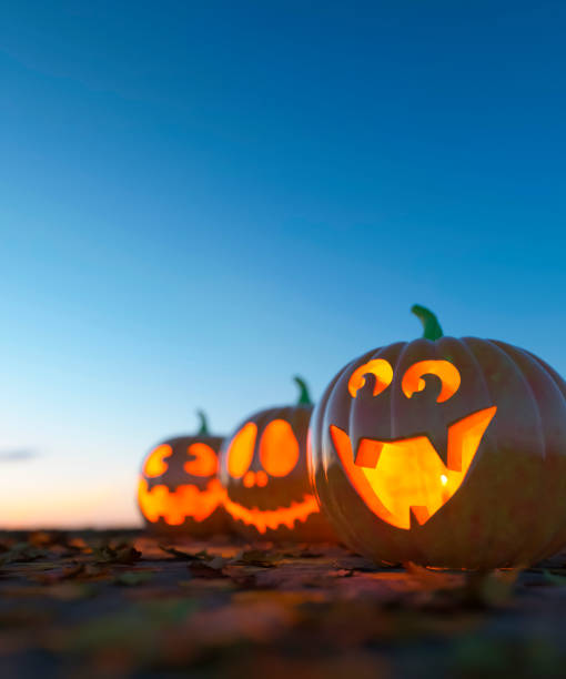 istock Group of carved pumpkins at Halloween 3d render 1673613895