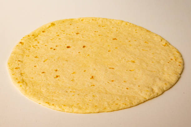 istock Corn tortillas on white background. Unleavened bread 1673622464