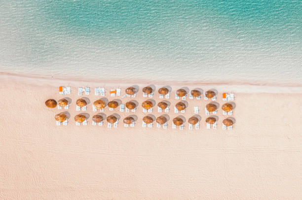 istock heavenly beach with beach umbrellas 1673667038