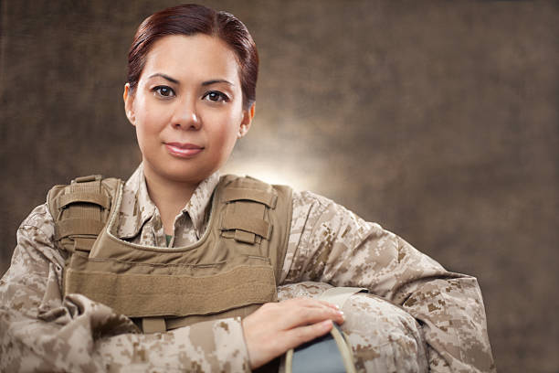 istock US Marine Female Soldier in Combat Gear 167367484