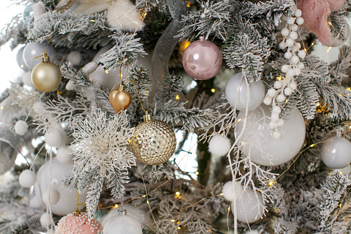 Christmas tree with colorful balls and flowers