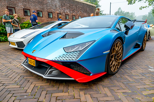 Lamborghini Huracán STO sports car parked on a street in Zwolle, Netherlands. The STO is a high performance edition of the Lambo Huracan with extreme aerodynamics, track-honed handling dynamics, lightweight contents and a high performing V10 engine.