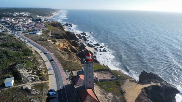 istock Aerial view of a lighthouse situated on a beach. 1673712141