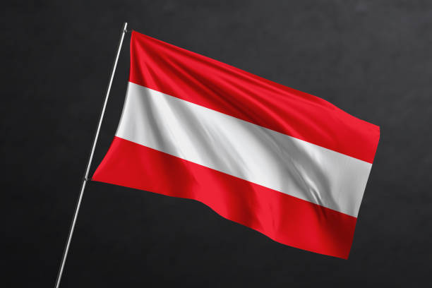 istock 3D Waving flag design. Austria National flag on black background. 1673716521