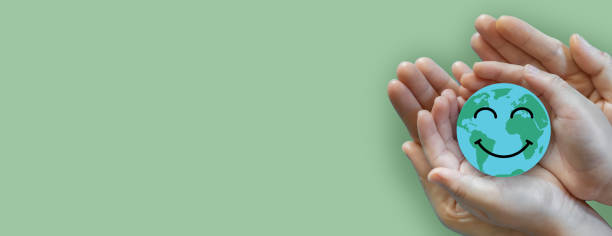 istock Hand holding paper cut saving clean energy earth globe world environment green eco friendly, save planet, csr social responsibility.campaign save the earth and earth Day 22 April 1673732123