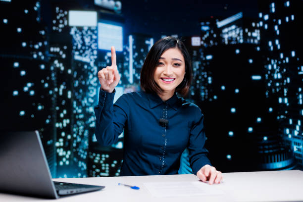 istock Talk show host covering latest news 1673734216