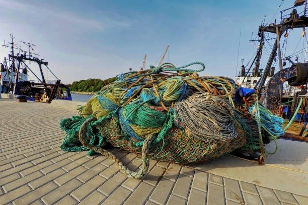 istock Fishing nets thrown in the harbor. 1673735930