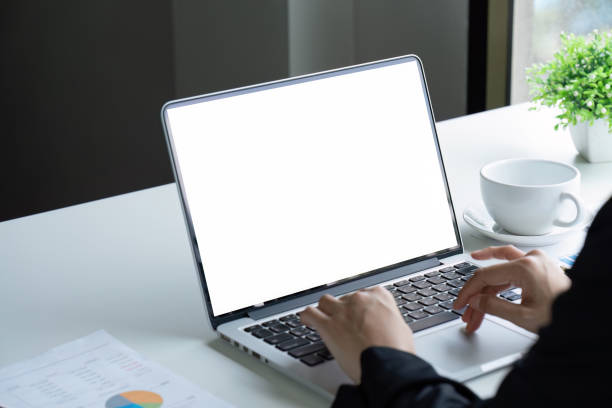 istock Closeup shot of hands using laptop and typing on keyboard, searching information. blank screen 1673745611