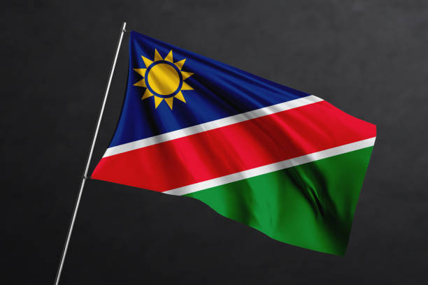 istock 3D Waving flag design. Namibia National flag on black background. 1673746186