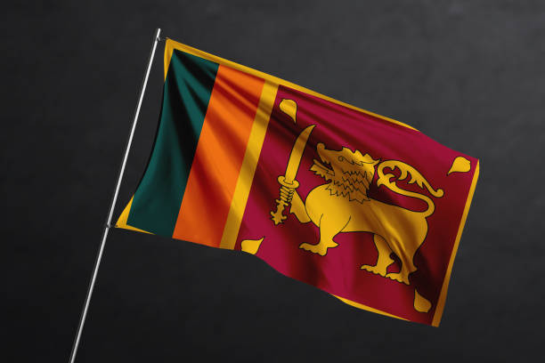 istock 3D Waving flag design. Sri Lanka National flag on black background. 1673748940