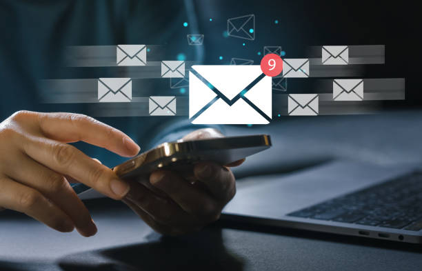 istock Human use phone with email and surfing the internet with email icon, e-mail communication, e-mail marketing, send e-mail, news letter, data link tech, online working internet network 1673754368
