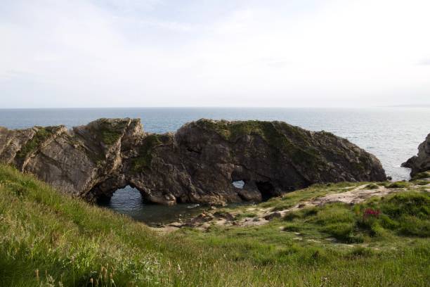 istock Lulworth Cove in Jurassic Dorset 1673765557