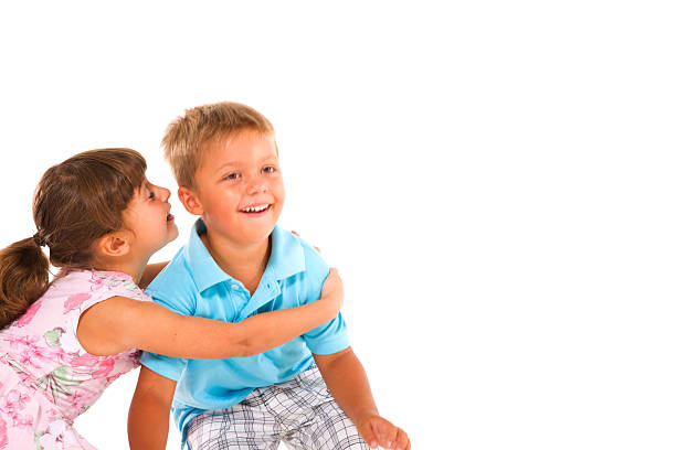 istock boy and girl smiling 167378628