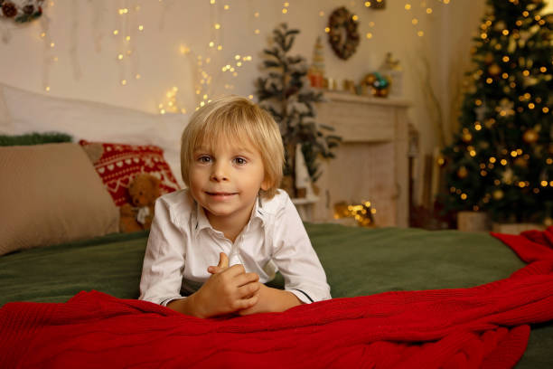istock Cute child, boy, playing in a decorated room for Christmas 1673790378