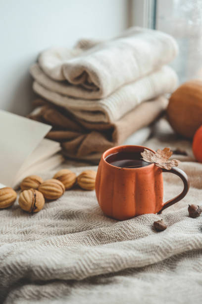 istock Cup of hot tea and a leaf, autumn mood 1673819711