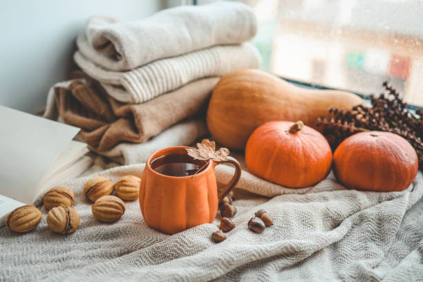 istock Cup of hot tea and a leaf, autumn mood 1673819715