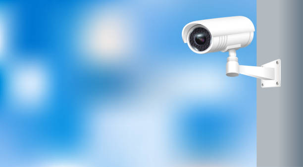 istock Close up of CCTV camera over defocused background. Security monitoring system for smart home, company. Vector 1673840812