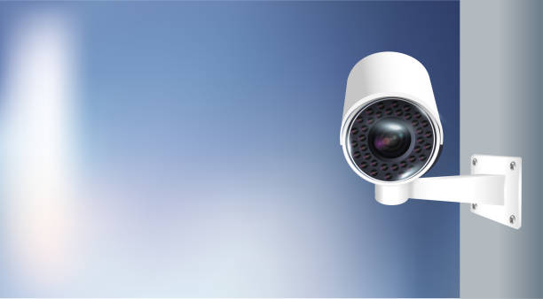 istock Close up of CCTV camera over defocused background. Security monitoring system for smart home, company. Vector 1673841333
