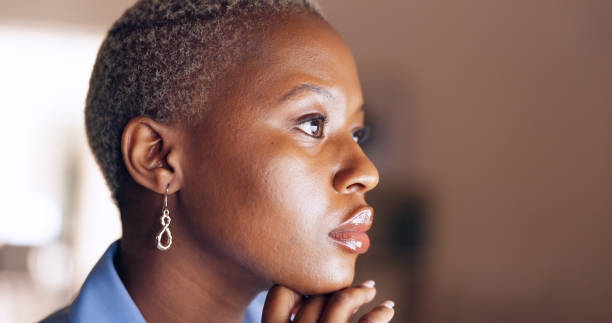 istock Night, office and thinking black woman with research, planning and information, analysis or proposal. Face, profile and African lady manager profile online for schedule, check or project management 1673841346
