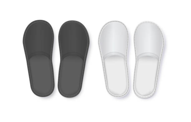 istock Realistic White and Black Detailed Hotel Slippers on White Background. Comfortable Footwear. Vector 1673857382