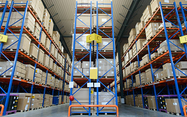 Modern warehouse shelves stocked with cardboard boxes
