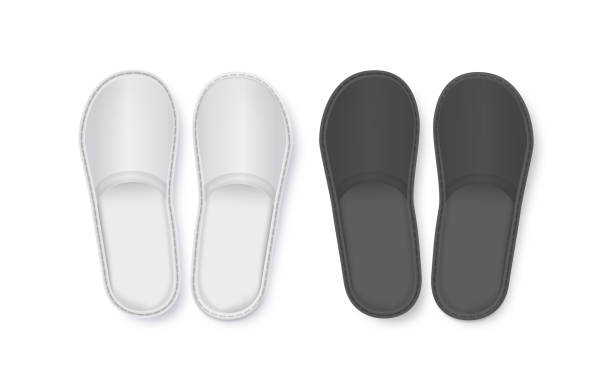 istock Realistic White and Black Detailed Hotel Slippers on White Background. Comfortable Footwear. Vector 1673861516