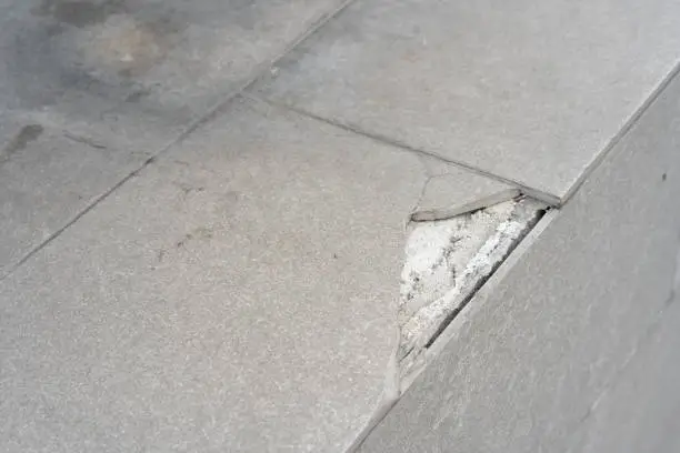 Photo of Broken gray tiles