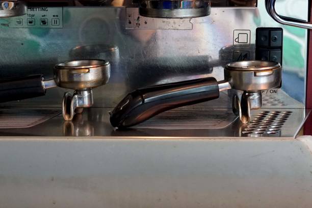 istock A front veiw of  a tools handle  with a ground coffee for preparing  machine making espresso in a cafe. 1673874626