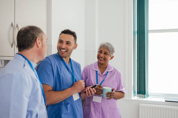 istock Catching Up with Coworkers at Work 1673923281