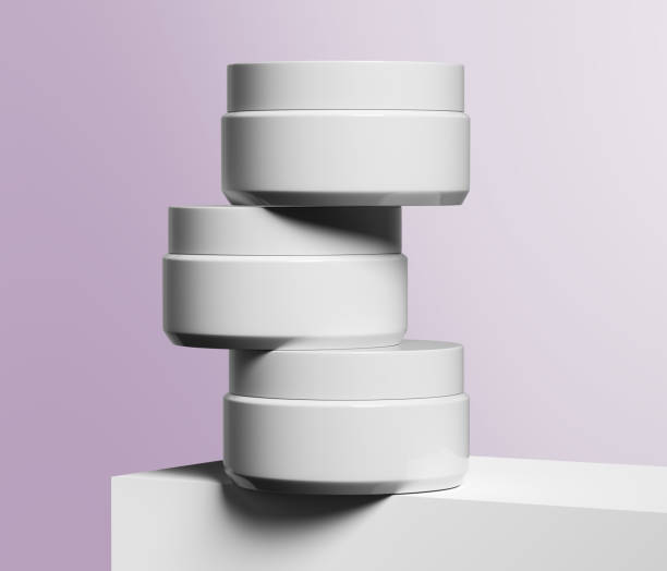 istock Three round white plastic jars bottles for cosmetics. Mockup template 1673963757