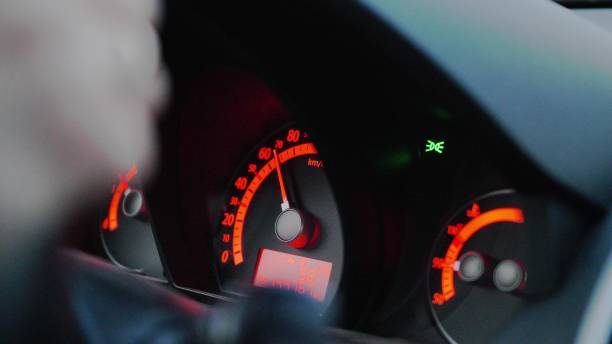 istock Car Dashboard and Female Hands Holding Steering Wheel During Driving 1673976915