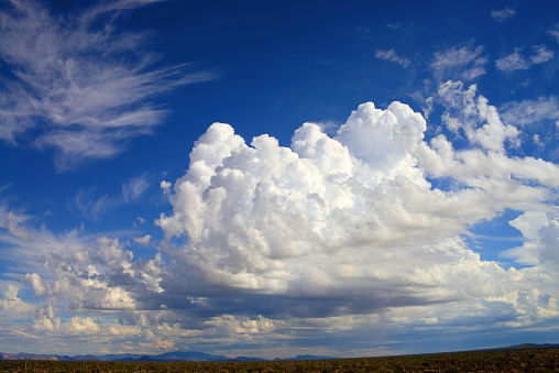 Storm clouds forming over The Vast Sonora desert in central Arizona USA on a early Spring morning