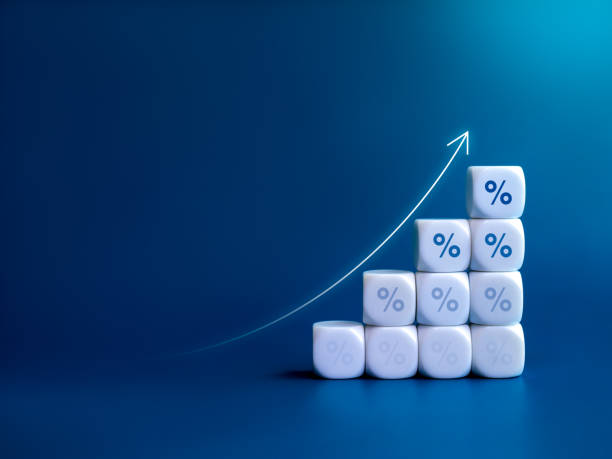 istock Rise up arrows on white cube blocks bar graph chart steps with percentage icon isolated on blue background with copy space. Investment, income, trends, business growth, economic improvement concepts. 1673996729