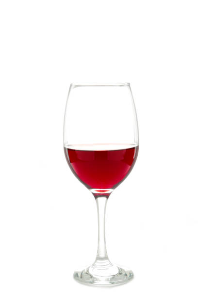istock Red wine in a glass isolated on white background 1674001031